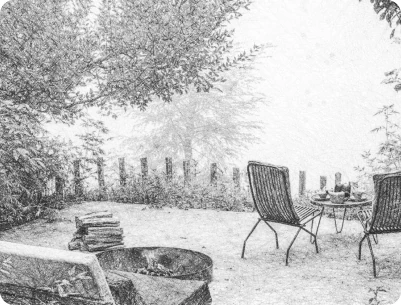Outdoor seating with chairs and a table in the snow